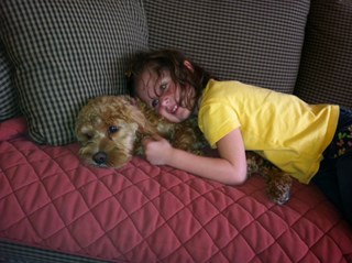 Jacey laying on Izzy
